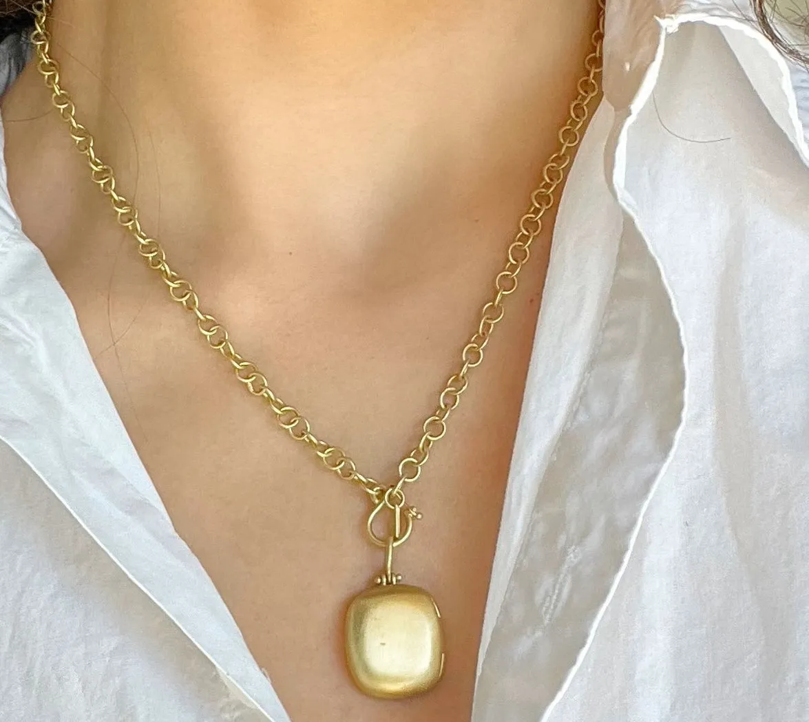 18 Karat Gold Cushion-Shaped Locket
